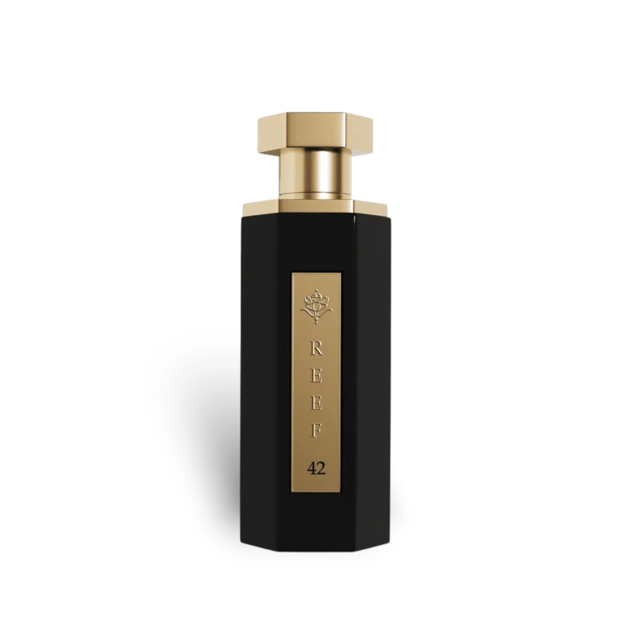 Soghaat Reef 42 unisex Eau de Parfum in a sleek black hexagonal bottle with a gold cap and label.