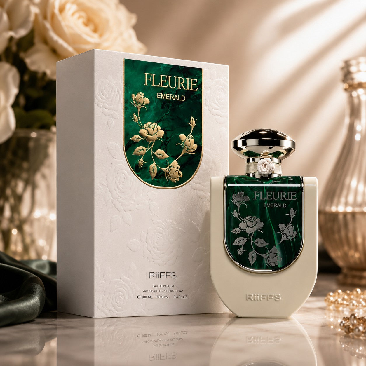Soghaat RiiFFS Fleurie Emerald 100ml Eau de Parfum bottle and white floral embossed box on a marble surface.