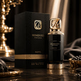 Soghaat RiiFFS Momento 100ml Extrait de Parfum bottle and black textured box with gold accents on a marble surface.