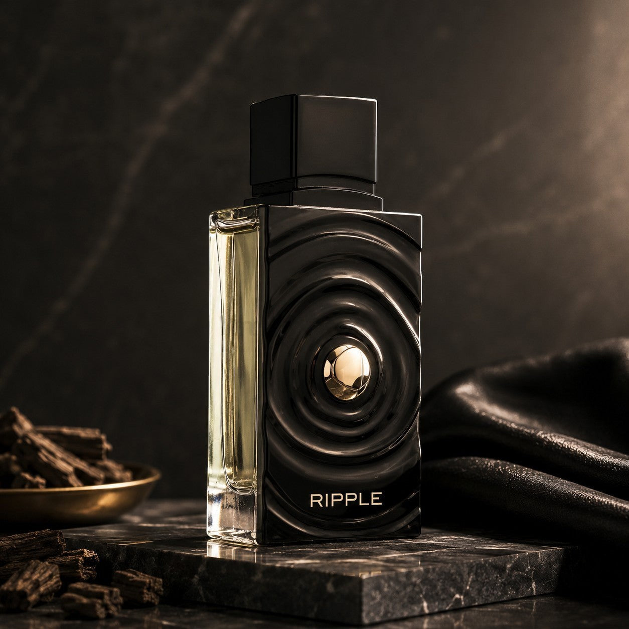 Soghaat Ripple 100ml Extrait de Parfum, a unisex fresh woody aromatic fragrance in a black bottle with gold accents.