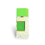 Soghaat Rizz Extrait de Parfum, a unisex fragrance with a clear liquid in a textured glass bottle and a bright green cap. Features citrus, spice, and woody notes.