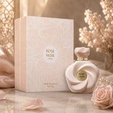 Soghaat Rose Noir Extrait de Parfum 75ml bottle and box in soft pink, featuring floral design and elegant packaging.