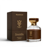 Soghaat Smokilla 100ml Extrait de Parfum bottle and box, amber woody oriental unisex fragrance with tobacco leaf and vanilla notes.