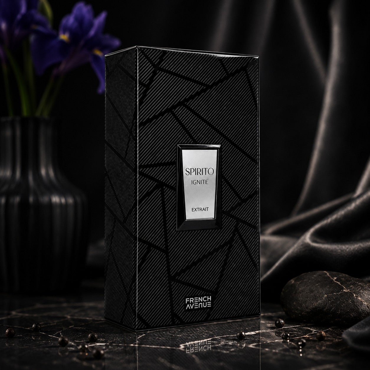 Soghaat French Avenue Spirito Ignite Extrait de Parfum box with geometric black pattern, iris flowers, and dark decor.