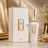 Soghaat Spirito Mystic Extrait de Parfum by French Avenue in a white and gold bottle with matching textured box.