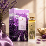 Soghaat Swiss Arabian Enigma of Taif Extrait de Parfum bottle and purple illustrated box on a table with lavender.