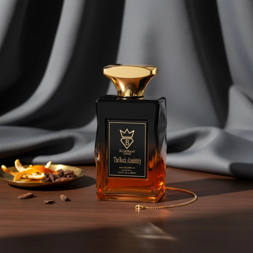 Soghaat The Rock Absolutely 100ml Eau de Parfum for men, fresh woody aromatic with amber liquid and gold cap.