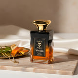 Soghaat The Rock Absolutely 100ml Eau de Parfum for men, fresh woody aromatic with amber liquid and gold cap.
