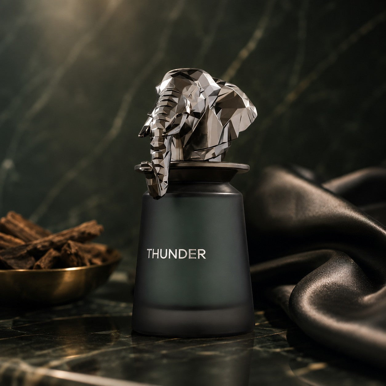 Soghaat Thunder 100ml Extrait de Parfum for men, a sweet amber gourmand fragrance with an elephant-shaped cap.