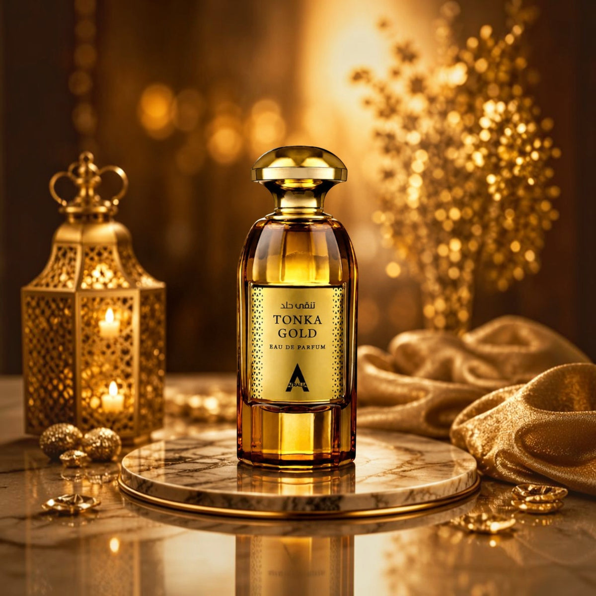 Soghaat Tonka Gold Eau de Parfum bottle in amber glass with gold cap, displayed on a marble stand with gold decor.