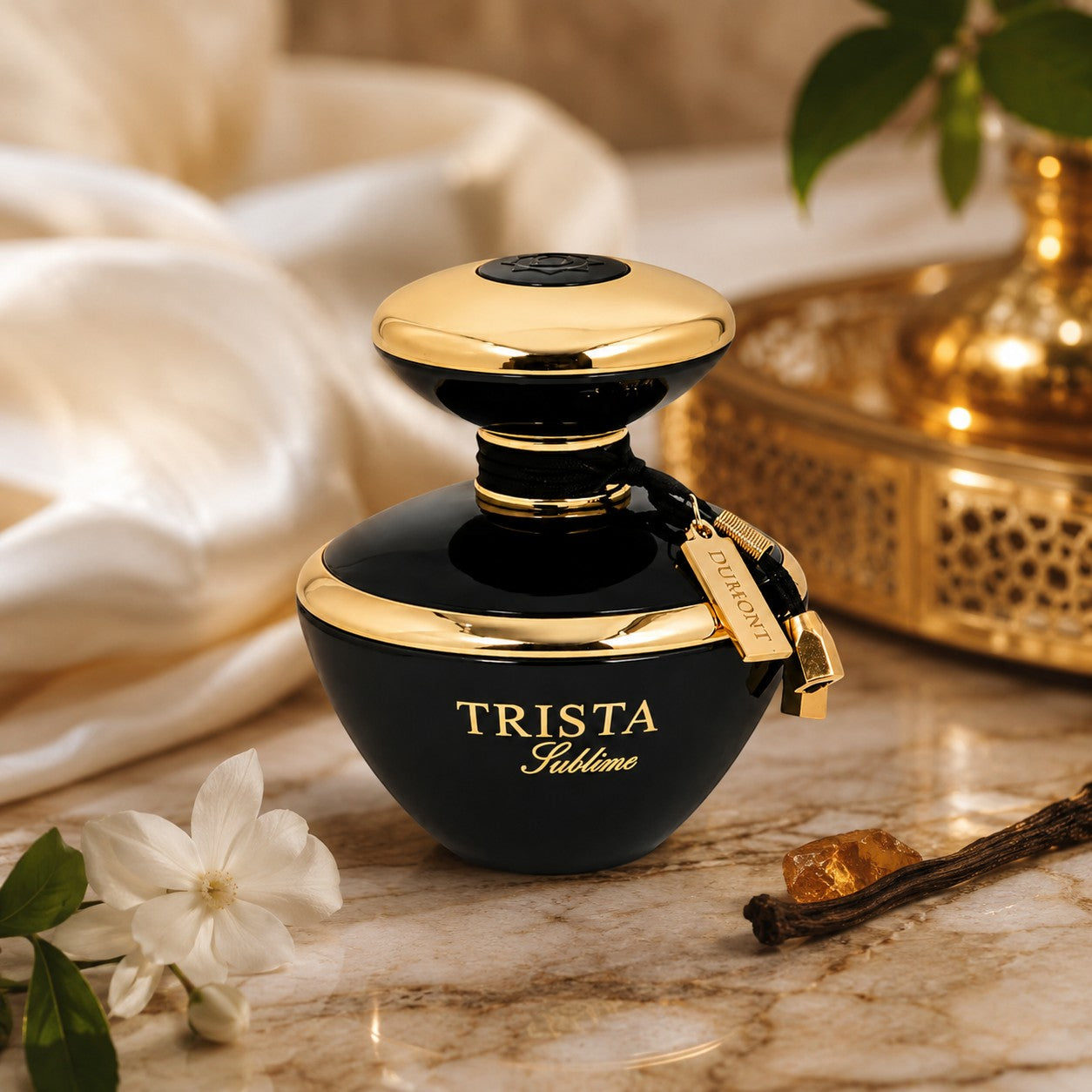 Soghaat Trista Sublime Eau de Parfum bottle in black and gold, featuring floral notes on a marble surface.
