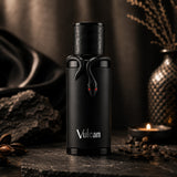 Soghaat French Avenue Vulcan Black Friday Edition perfume bottle featuring a black snake design on a dark stone surface.
