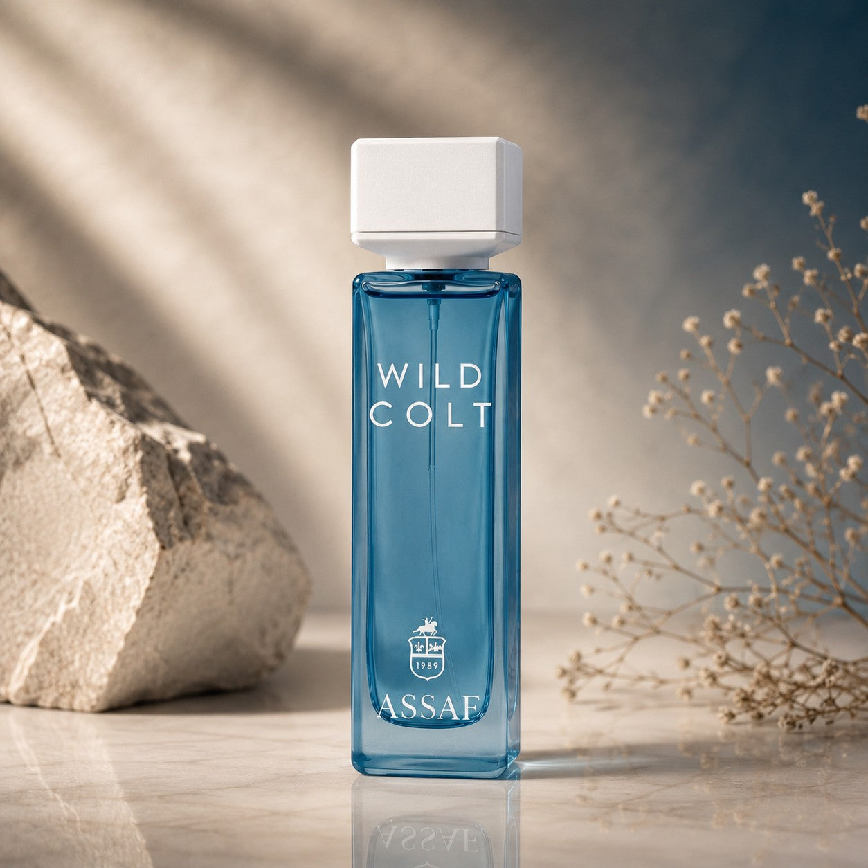 Soghaat Wild Colt 200ml Eau de Parfum, a fresh oud woody fragrance in a blue glass bottle with a white cap.