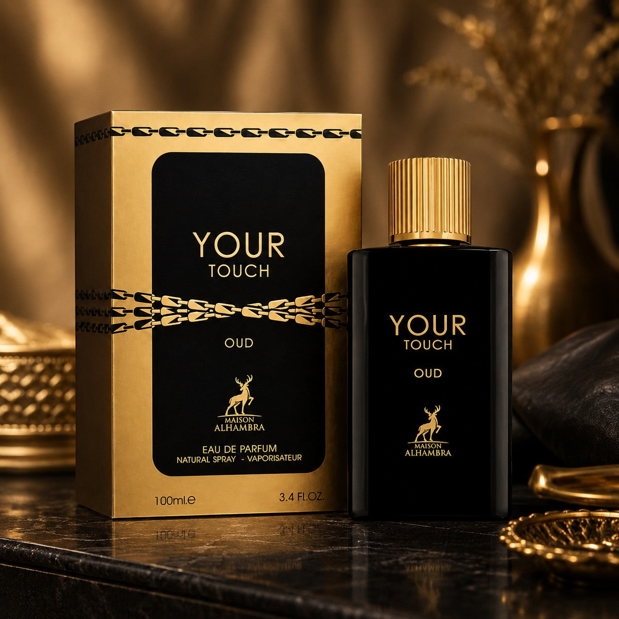 Soghaat Maison Alhambra Your Touch Oud Eau de Parfum 100ml bottle and gold box on a dark marble surface