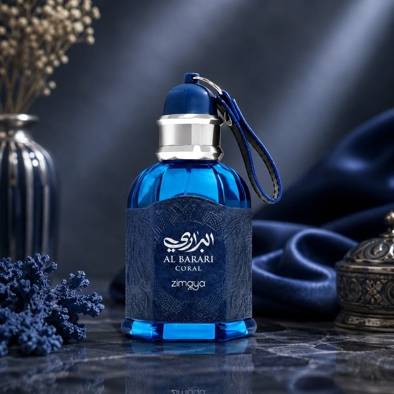 Soghaat Zimaya AL Barari Coral Eau de Parfum in a blue glass bottle with textured label on a dark marble surface