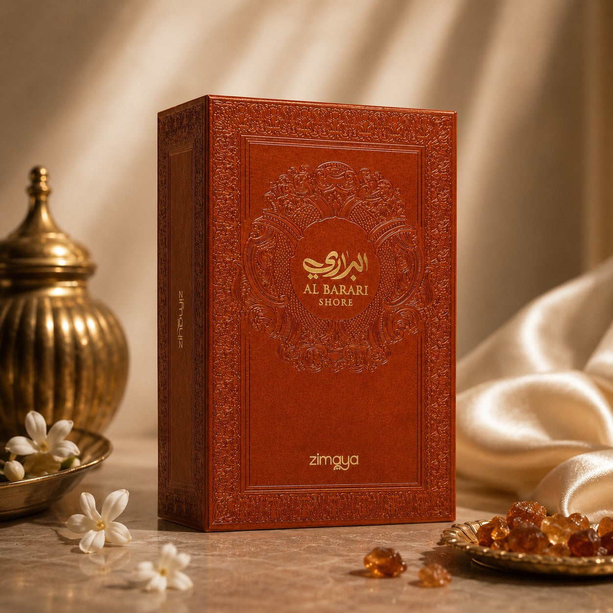 Soghaat Zimaya AL Barari Shore Eau de Parfum in a textured, ornate copper-brown box on a marble surface.