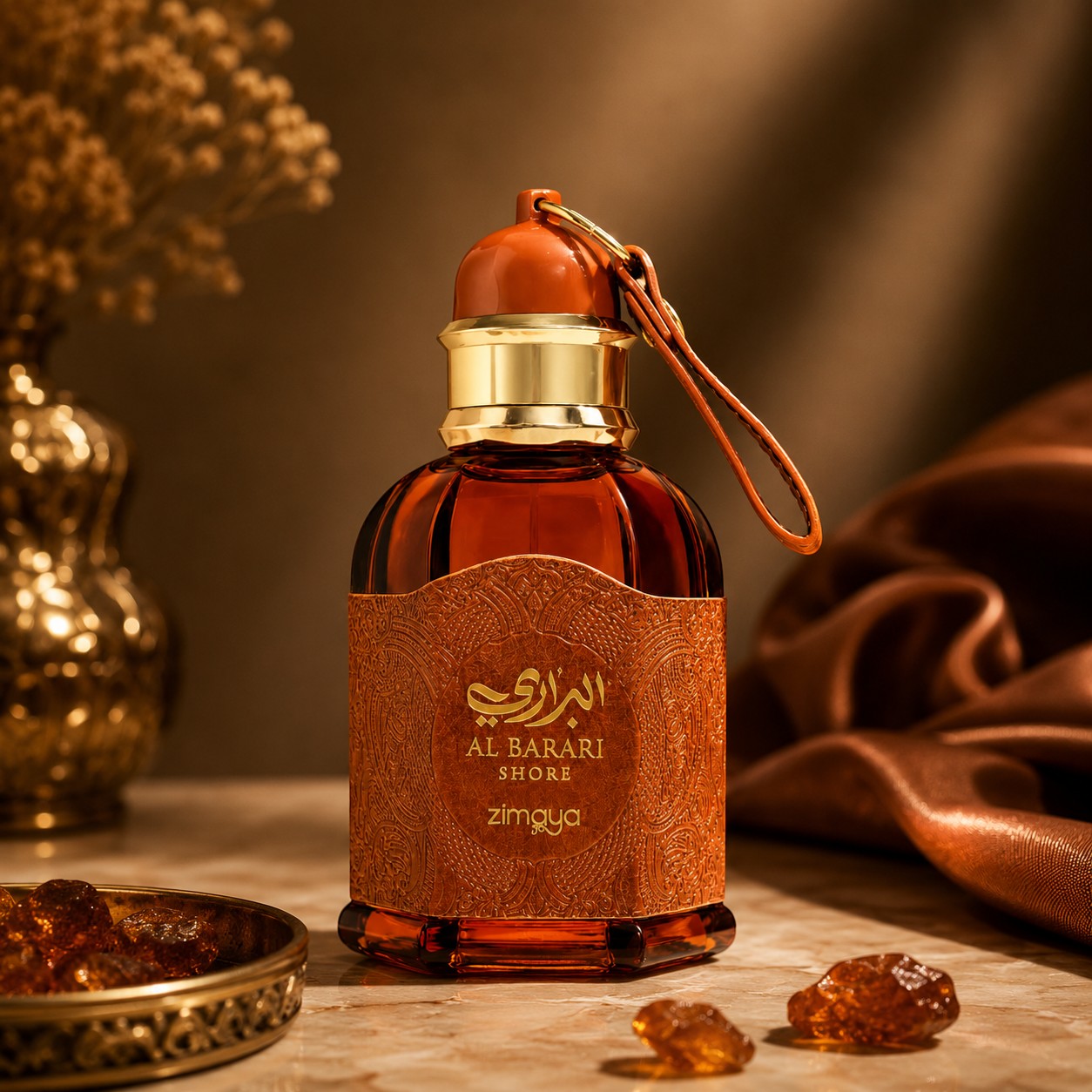 Soghaat Zimaya AL Barari Shore Eau de Parfum in an amber glass bottle with leather-textured label and gold cap.
