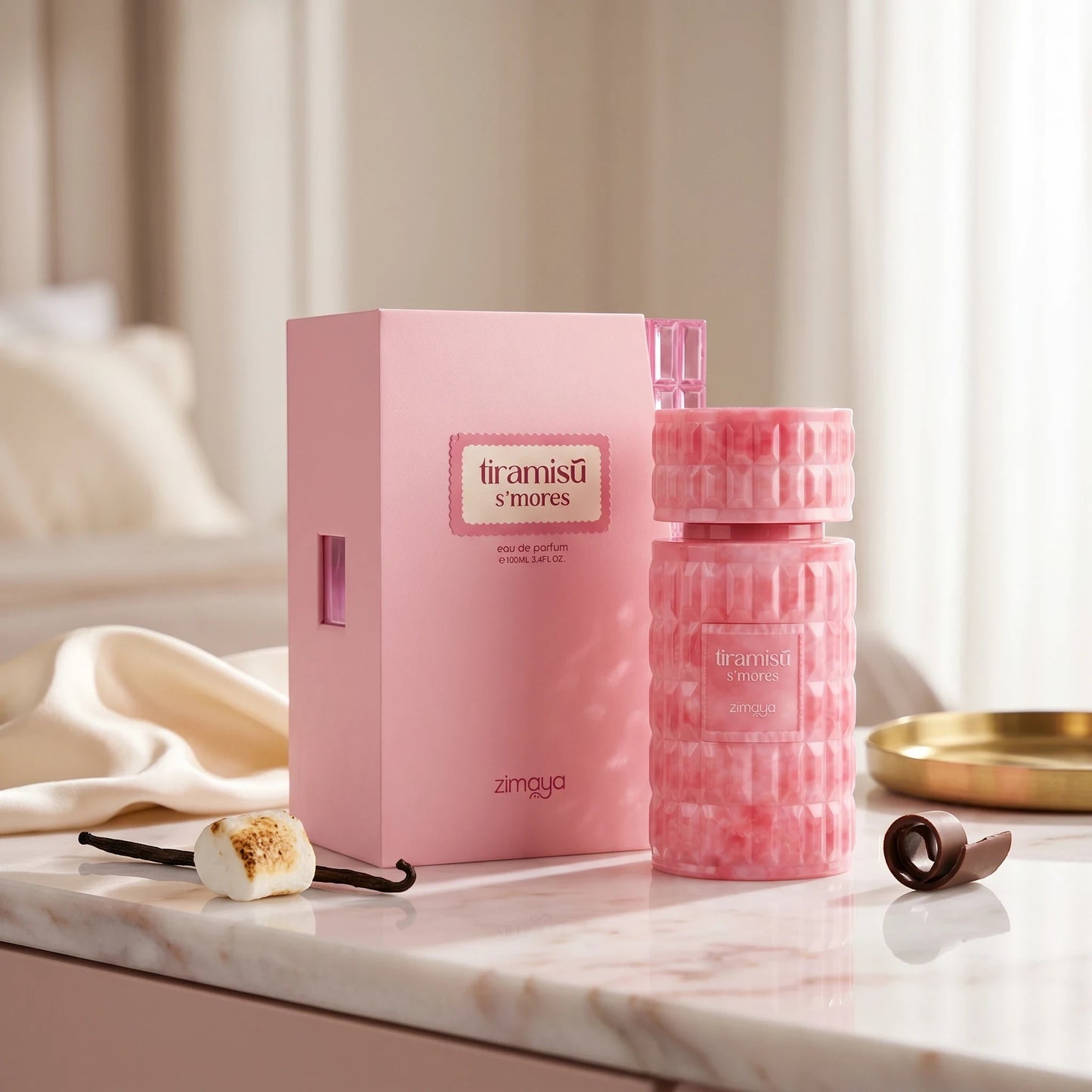 Soghaat Zimaya Tiramisu S'mores 100ml Eau de Parfum in a pink textured bottle and box with marshmallow and chocolate.